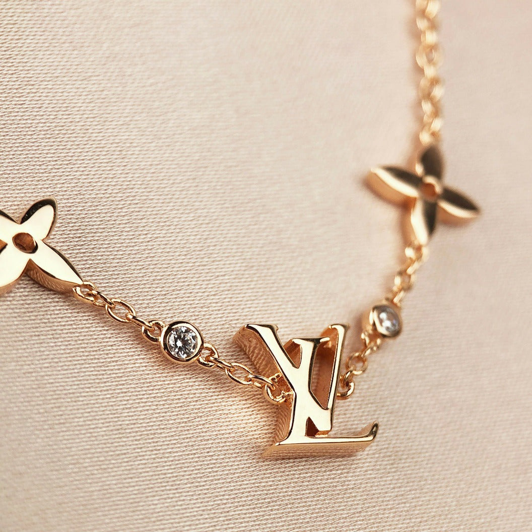 [Elara jewelsry ]STAR AND SUN 7 MOTIFS GOLD BRACELET