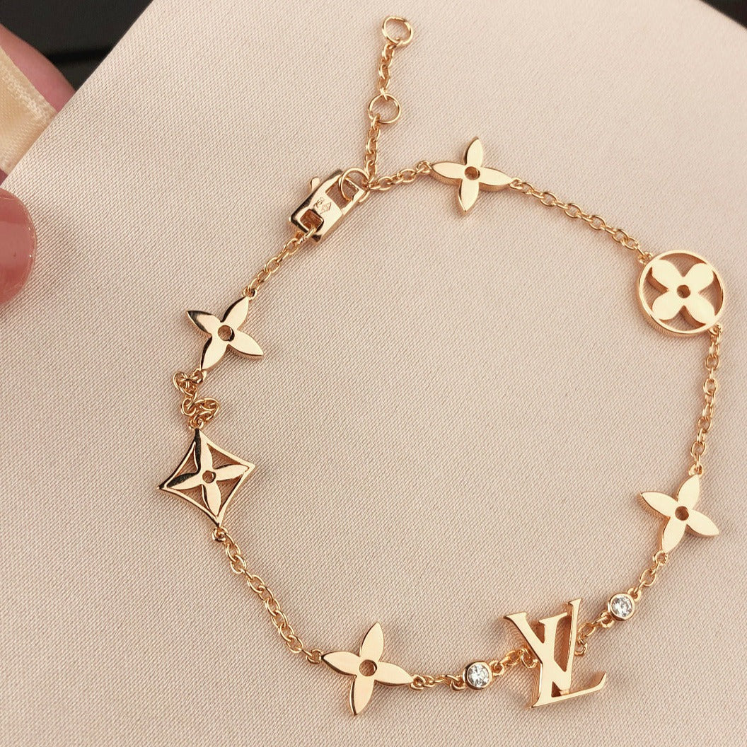 [Elara jewelsry ]STAR AND SUN 7 MOTIFS GOLD BRACELET