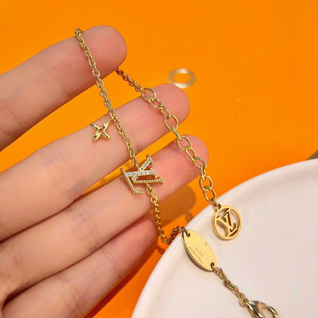 [Elara jewelsry ]LOGO STAR MOTIF GOLD BRACELET