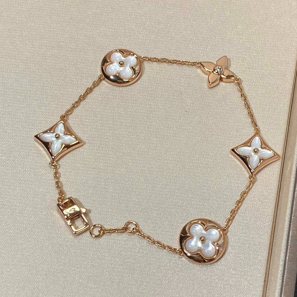 [Elara jewelsry ]STAR AND SUN 5 MOTIF MOP PINK GOLD BRACELET