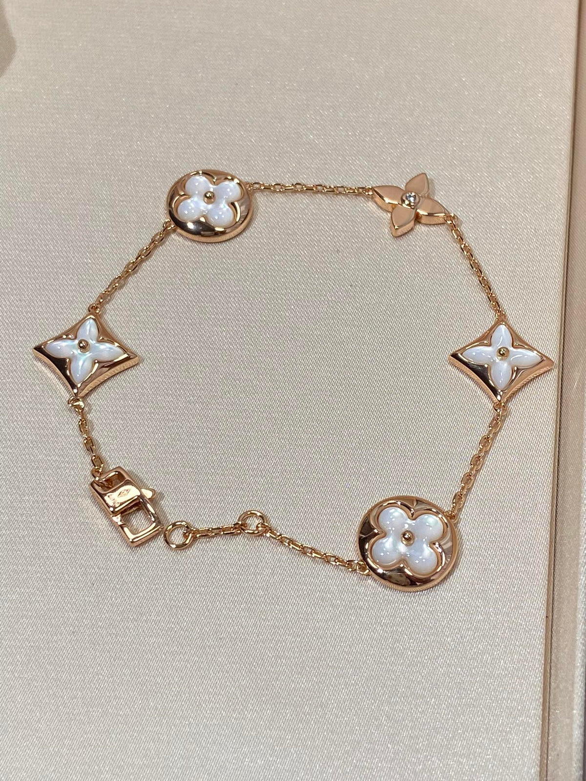 [Elara jewelsry ]STAR AND SUN 5 MOTIF MOP PINK GOLD BRACELET