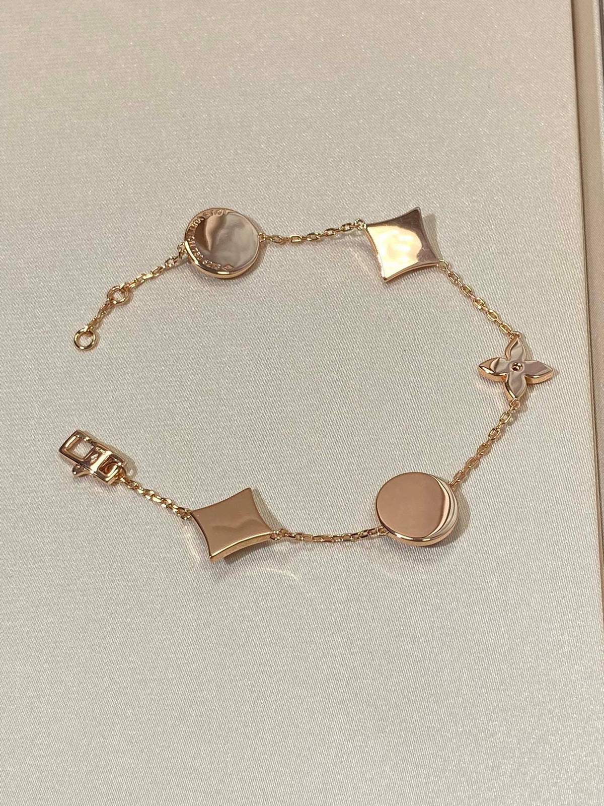 [Elara jewelsry ]STAR AND SUN 5 MOTIF MOP PINK GOLD BRACELET