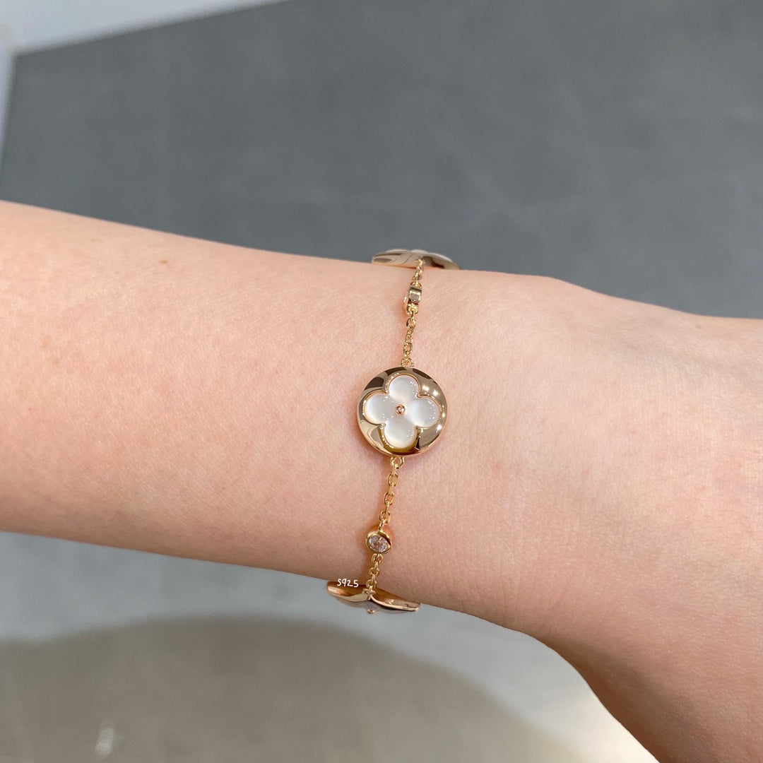 [Elara jewelsry ]STAR AND SUN 4 MOTIF WHITE MOP PINK GOLD BRACELET