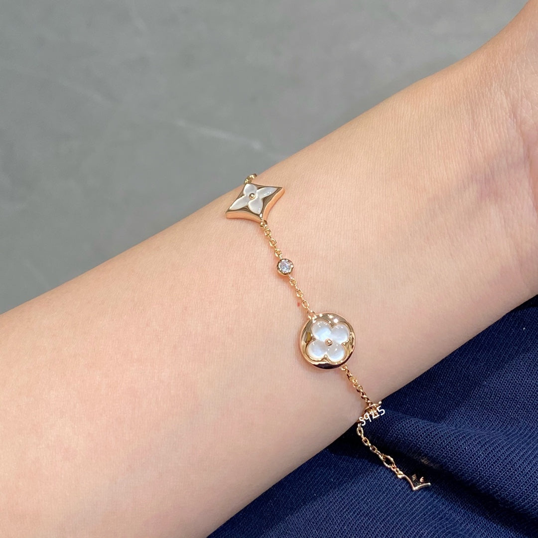 [Elara jewelsry ]STAR AND SUN 4 MOTIF WHITE MOP PINK GOLD BRACELET