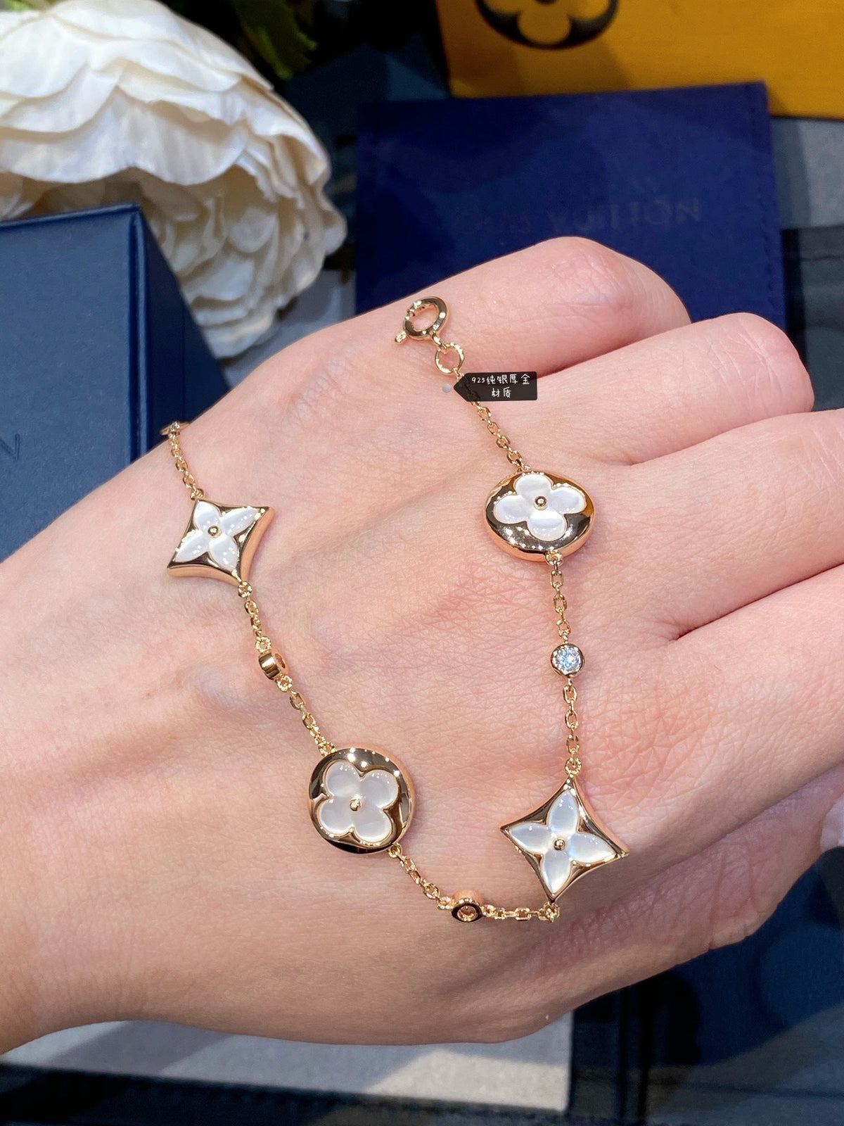 [Elara jewelsry ]STAR AND SUN 4 MOTIF WHITE MOP PINK GOLD BRACELET