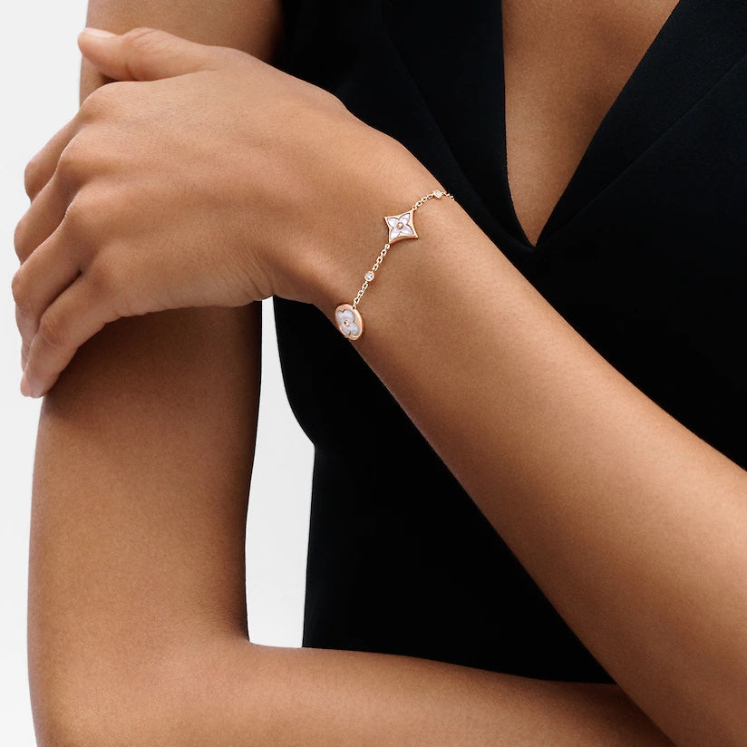 [Elara jewelsry ]STAR AND SUN 4 MOTIF WHITE MOP PINK GOLD BRACELET