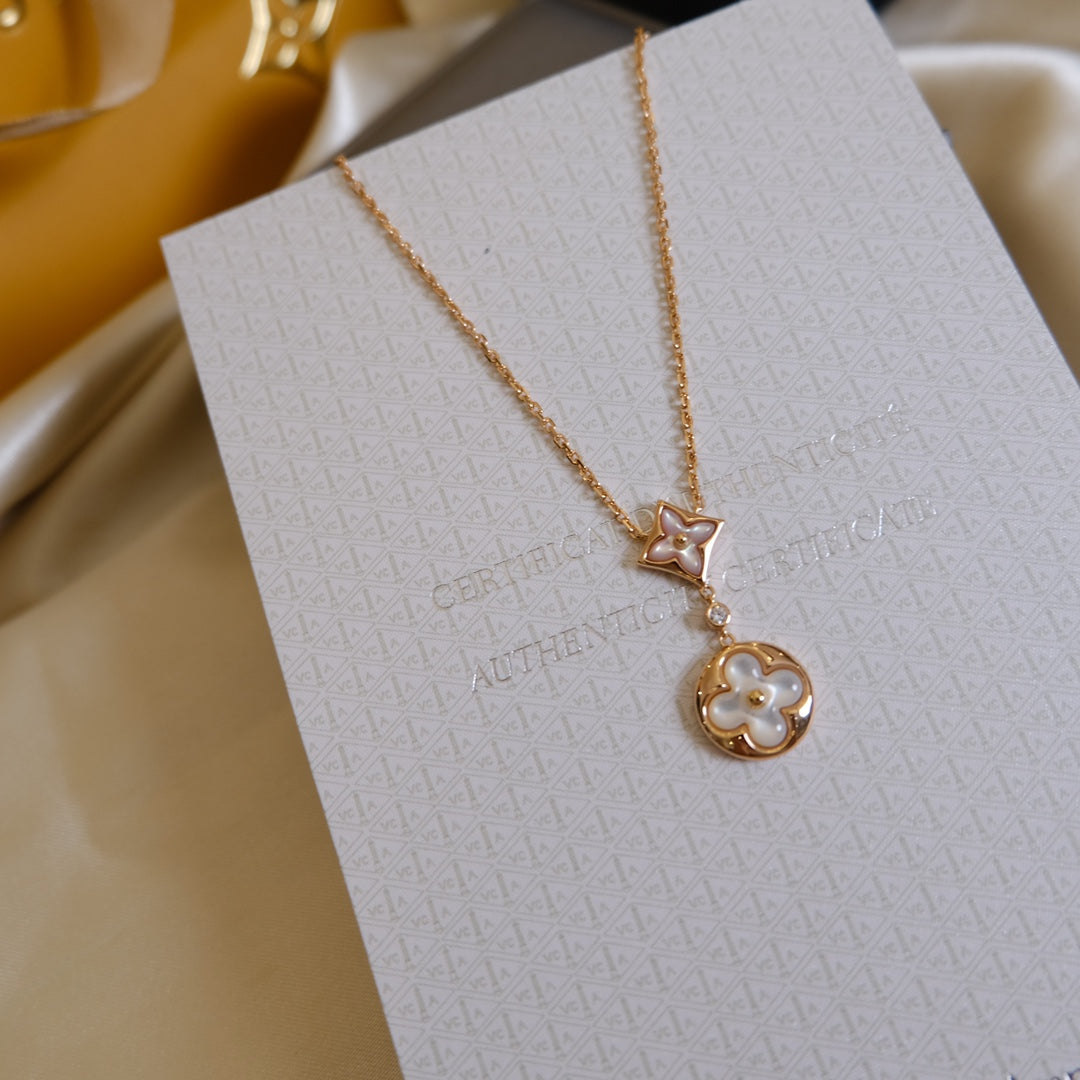 [Elara jewelsry ]STAR AND SUN WHITE MOP 2 MOTIF PINK GOLD NECKLACE