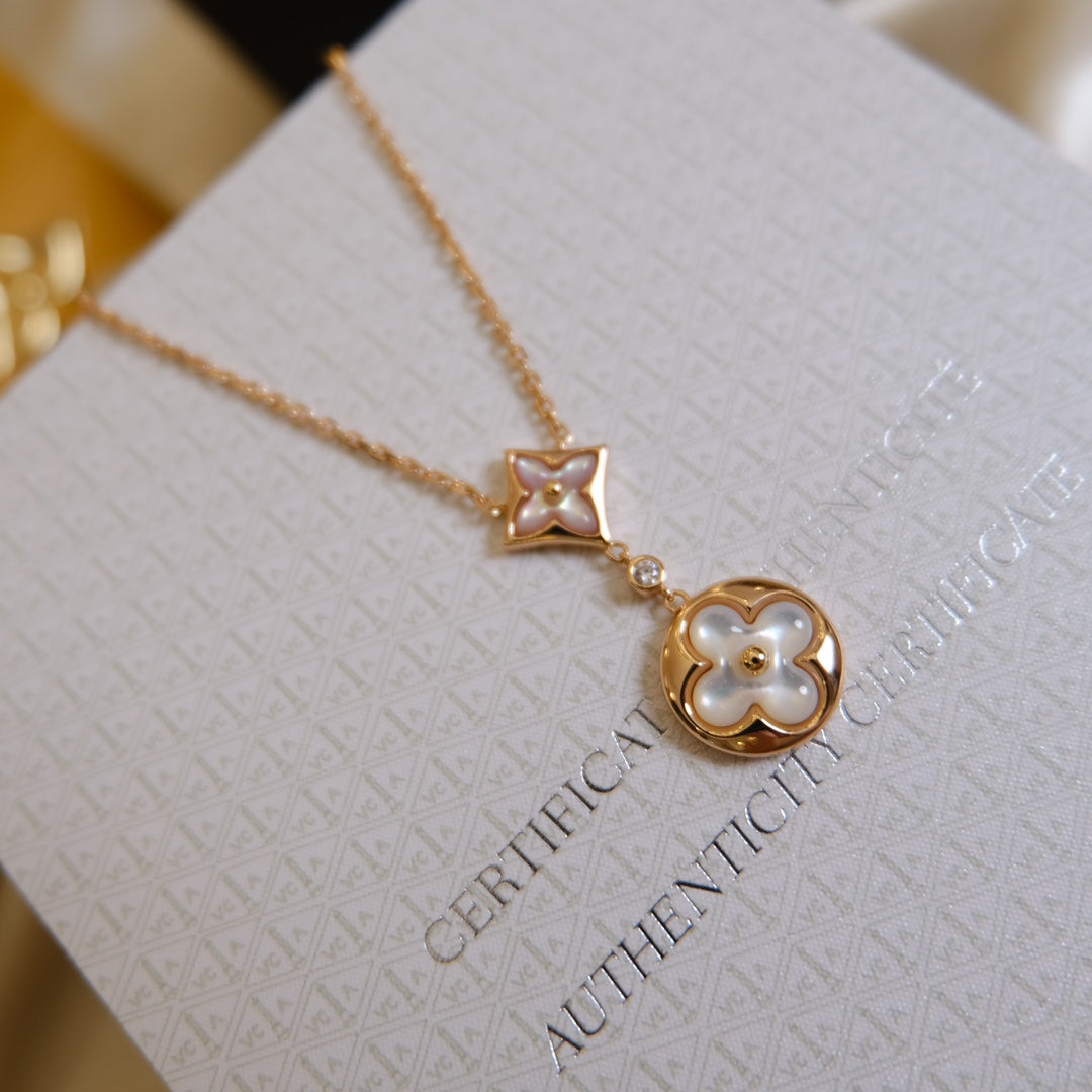 [Elara jewelsry ]STAR AND SUN WHITE MOP 2 MOTIF PINK GOLD NECKLACE