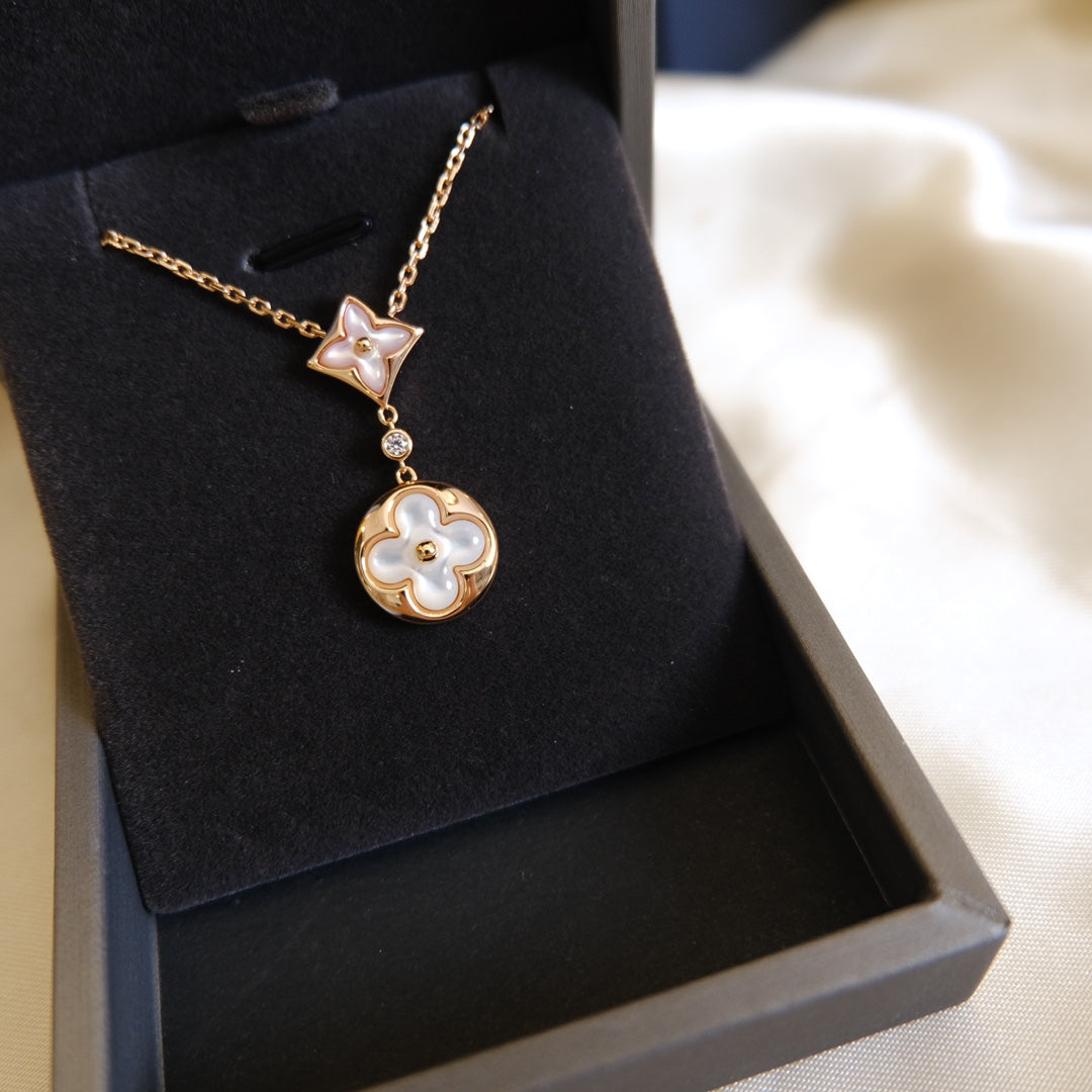 [Elara jewelsry ]STAR AND SUN WHITE MOP 2 MOTIF PINK GOLD NECKLACE