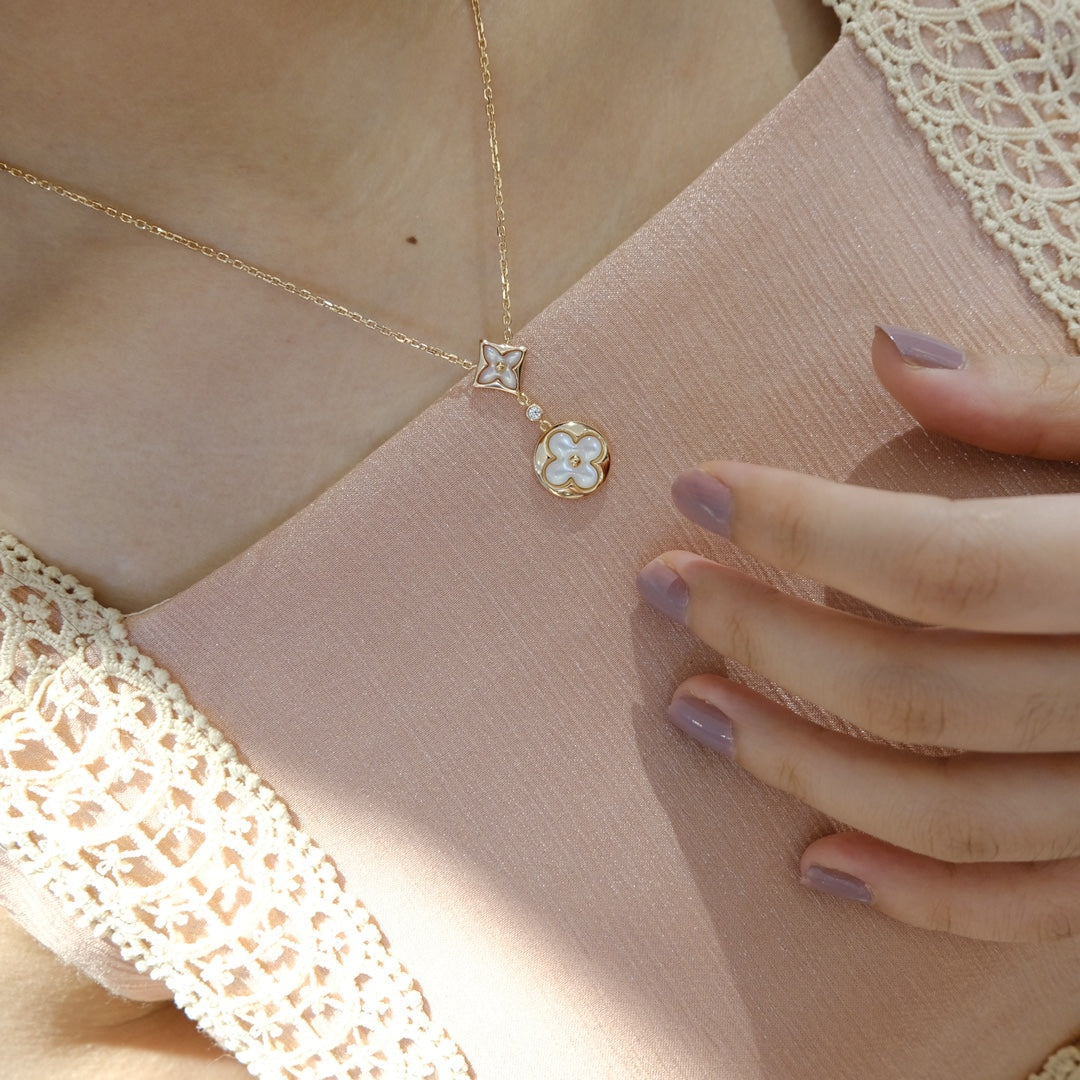 [Elara jewelsry ]STAR AND SUN WHITE MOP 2 MOTIF PINK GOLD NECKLACE
