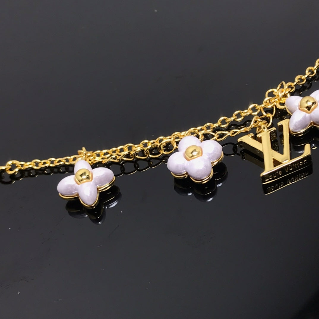 [Elara jewelsry ]LOGO 6 MOTIF STAR AND SUN GOLD BRACELET