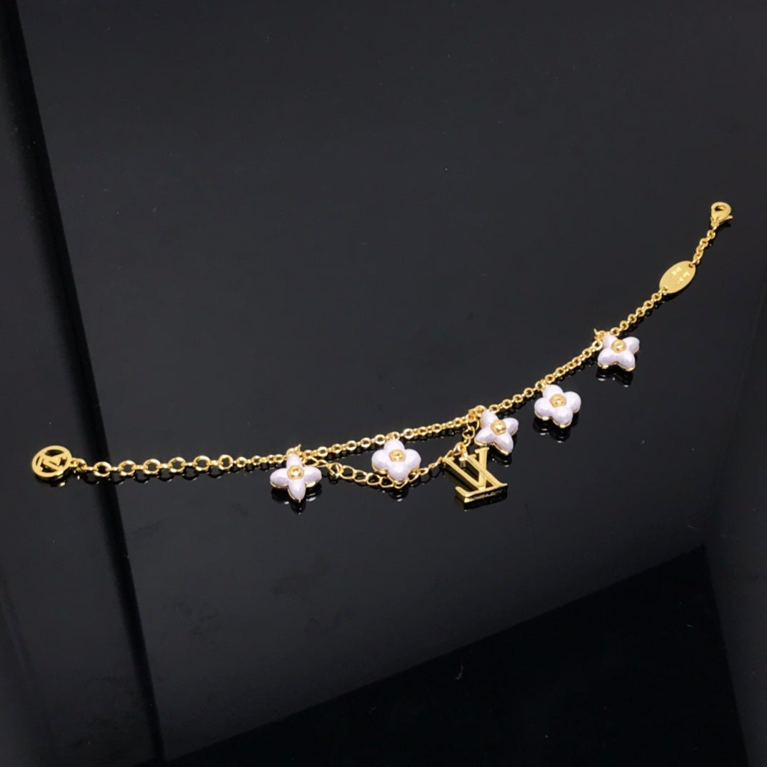 [Elara jewelsry ]LOGO 6 MOTIF STAR AND SUN GOLD BRACELET